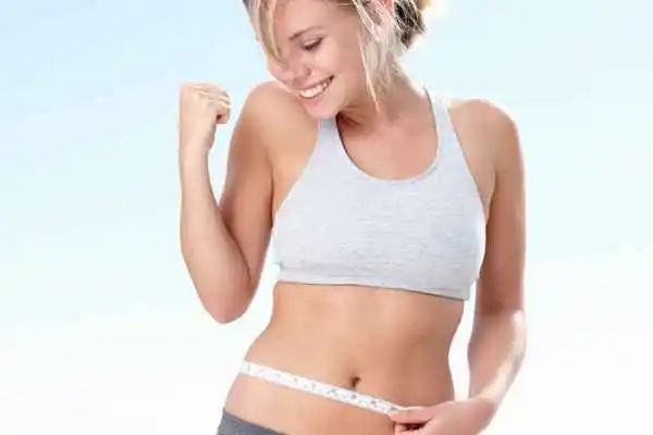 woman happy after fat reduction treatment Rutland